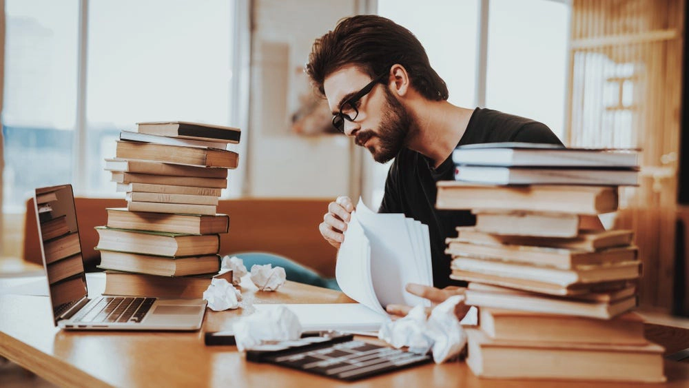 Person typing on a laptop
